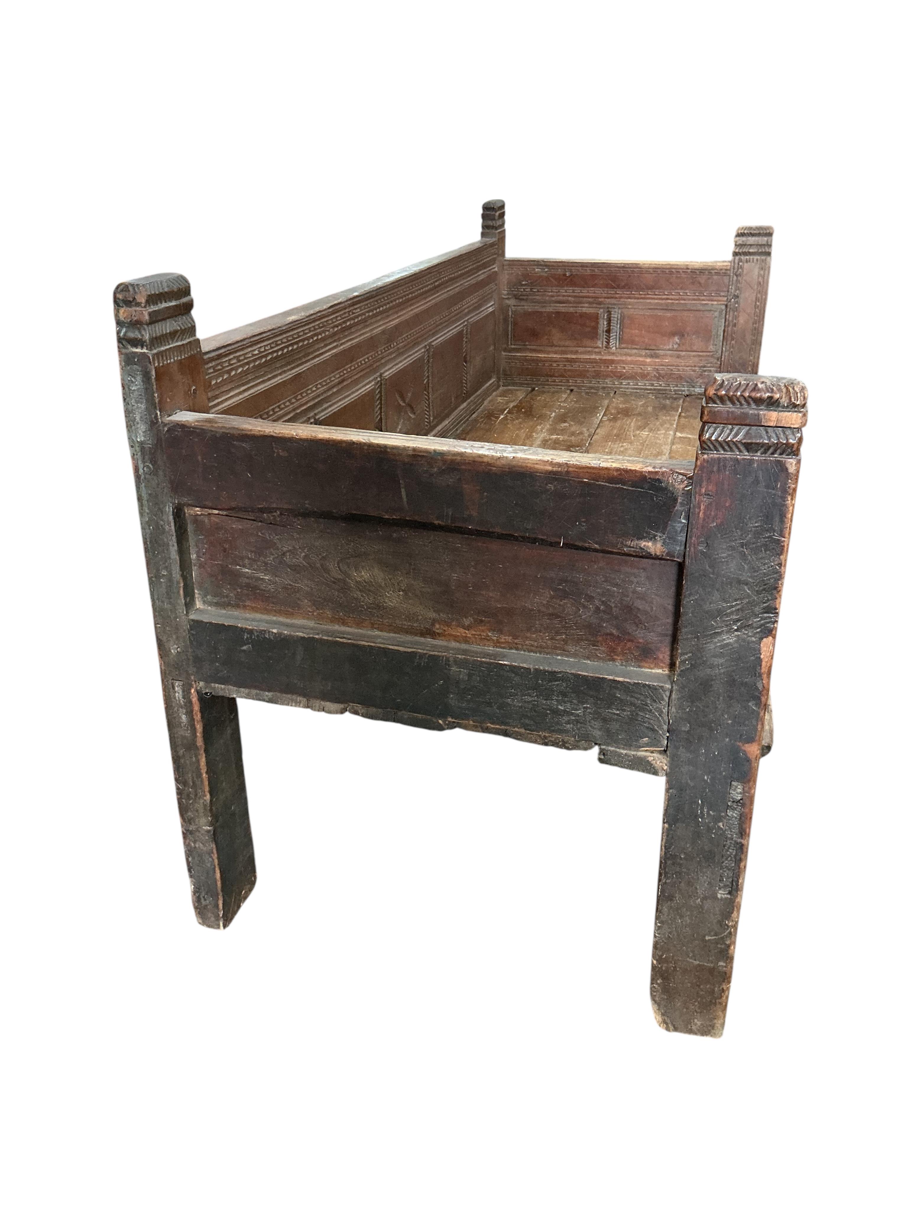 A 19th century Continental hardwood settee with upholstered cushions, width 190cm, depth 76cm, height 89cm, Provenance: The late Kenneth Turner (1936-2025), celebrity florist, designer and perfume retailer, he received t